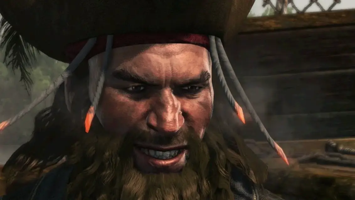 Blackbeard zeigt ein bösartiges Grinsen.