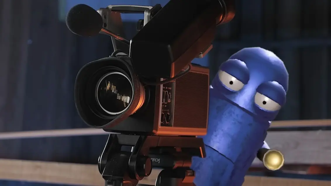 REPO blauer Roboter bedient eine Kamera