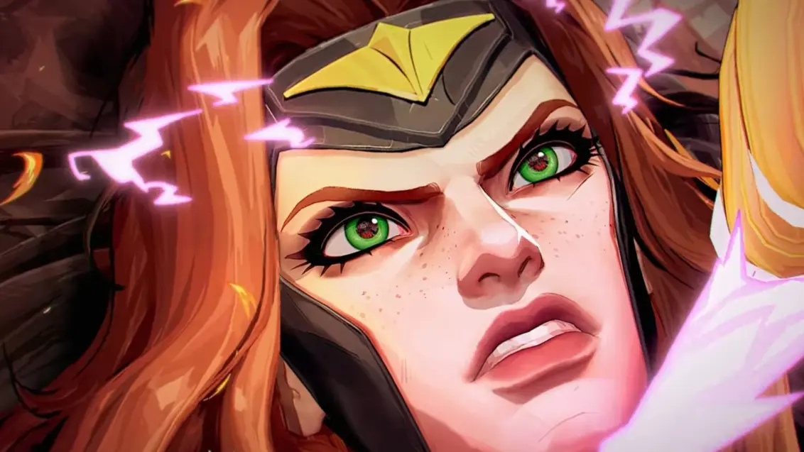 Marvel Rivals Saison 3: Phoenix beißt die Zähne zusammen, während sie von Hela, die nicht im Bild ist, zu Boden gedrückt wird.